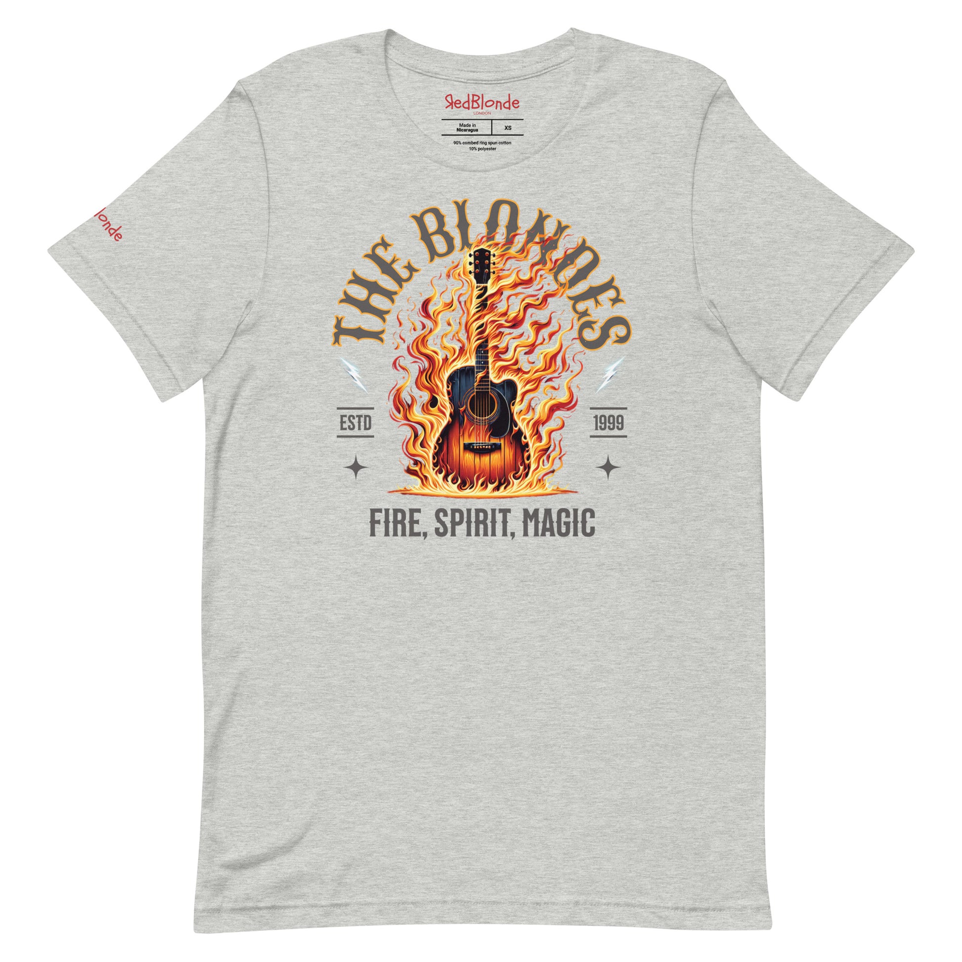 A grey unisex t-shirt with a graphic of a wooden guitar on fire with ‘THE BLONDES’ in Sancreek font above the burning guitar and ‘FIRE, SPIRIT, MAGIC' underneath. Branded RedBlonde London in inside neck and right sleeve.