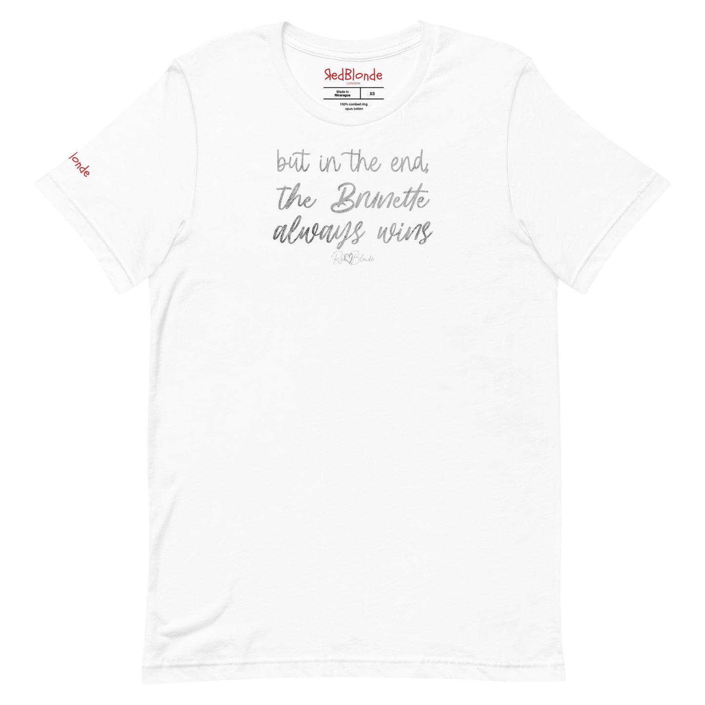 A white unisex t-shirt featuring the handwritten-style slogan “but in the end, the Brunette always wins” in Hillbear font  in light gray text across the chest, signed off RedBlonde. Branded “RedBlonde London on inside the collar and on the right sleeve