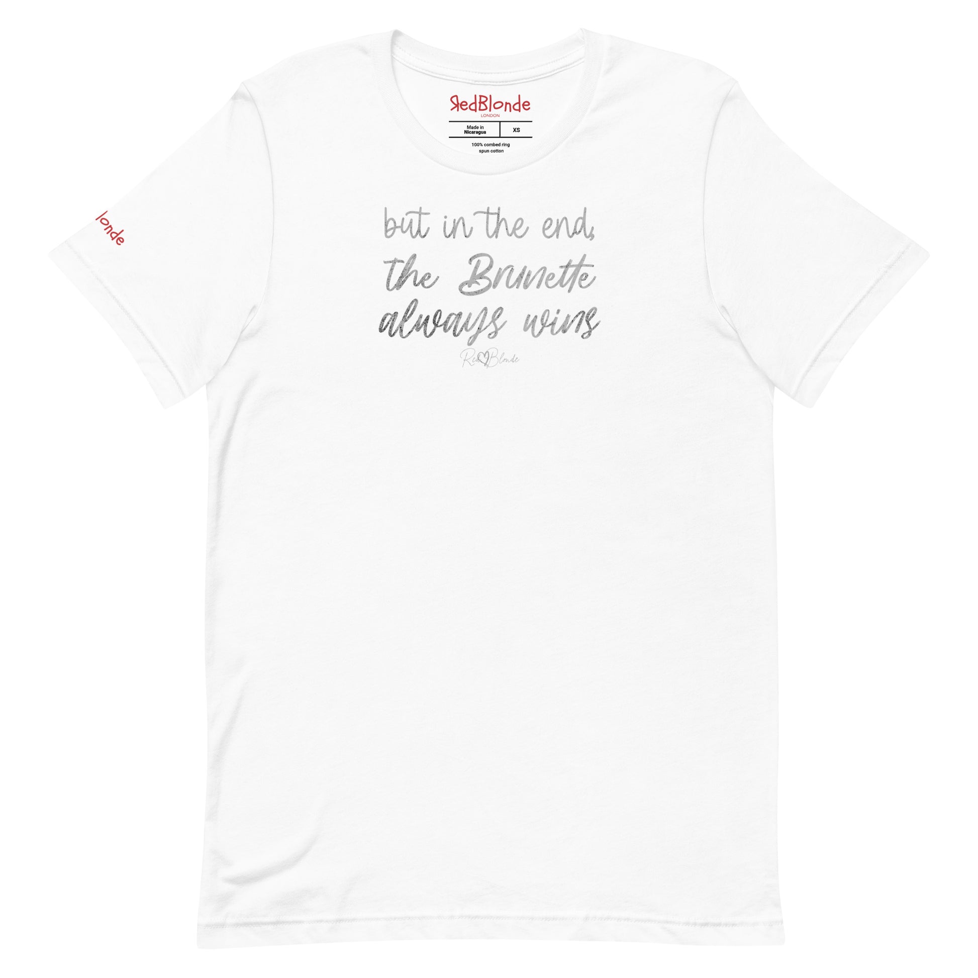 A white unisex t-shirt featuring the handwritten-style slogan “but in the end, the Brunette always wins” in Hillbear font  in light gray text across the chest, signed off RedBlonde. Branded “RedBlonde London on inside the collar and on the right sleeve
