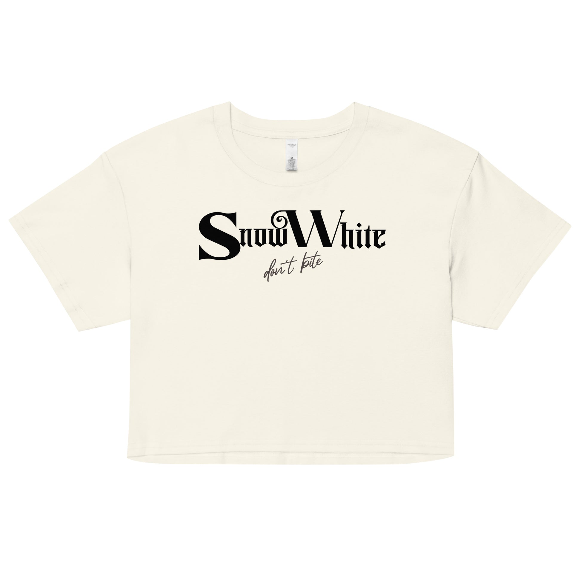 Beige women’s crop top featuring black Angel Rhapsody gothic-inspired font that reads “Snow White” and the phrase “don’t bite” written underneath in a cursive script.