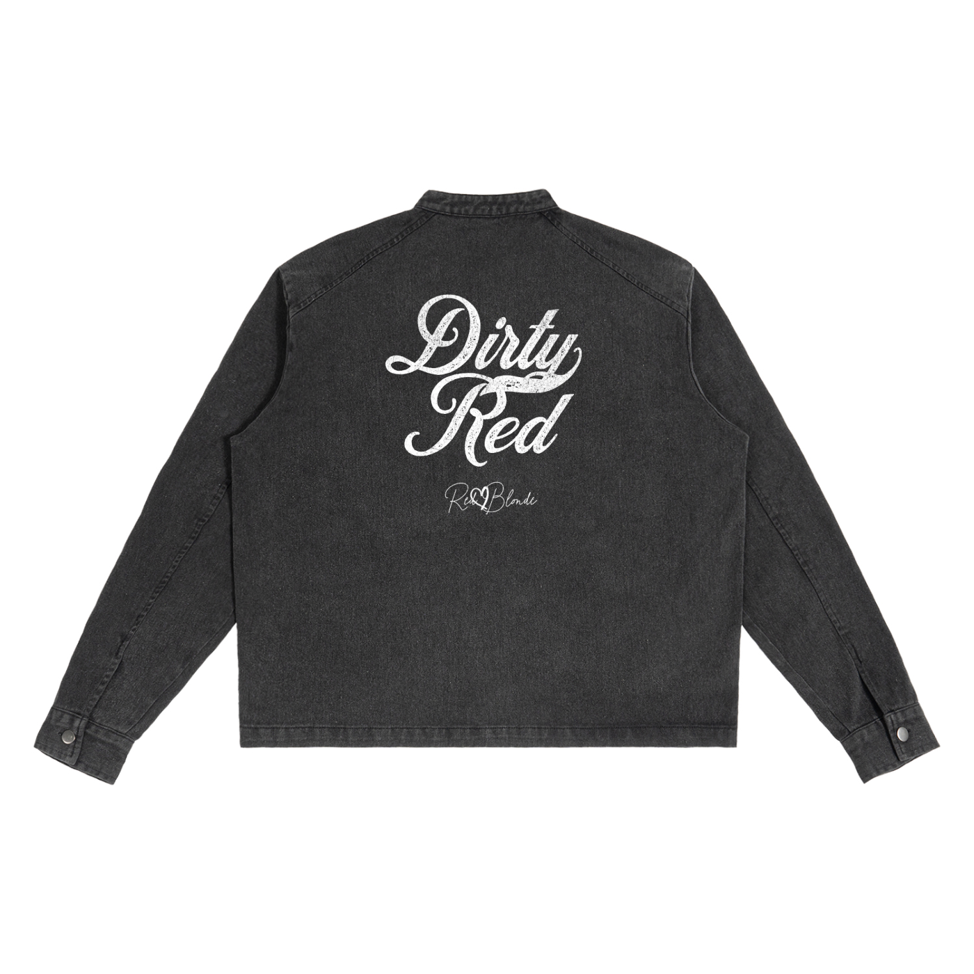 The back of a washed-black denim jacket showing large white embroidered Miklstore font script reading "Dirty Red" with the RedBlonde signature below. The jacket has a relaxed, slightly cropped silhouette and long sleeves with button cuffs.