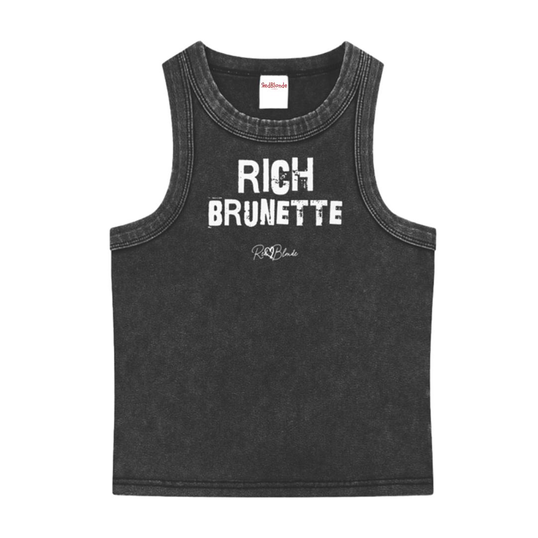 Black acid-wash vintage tank top with bold white Ed Gein font “RICH Brunette" slogan on the front and RedBlonde logo beneath.