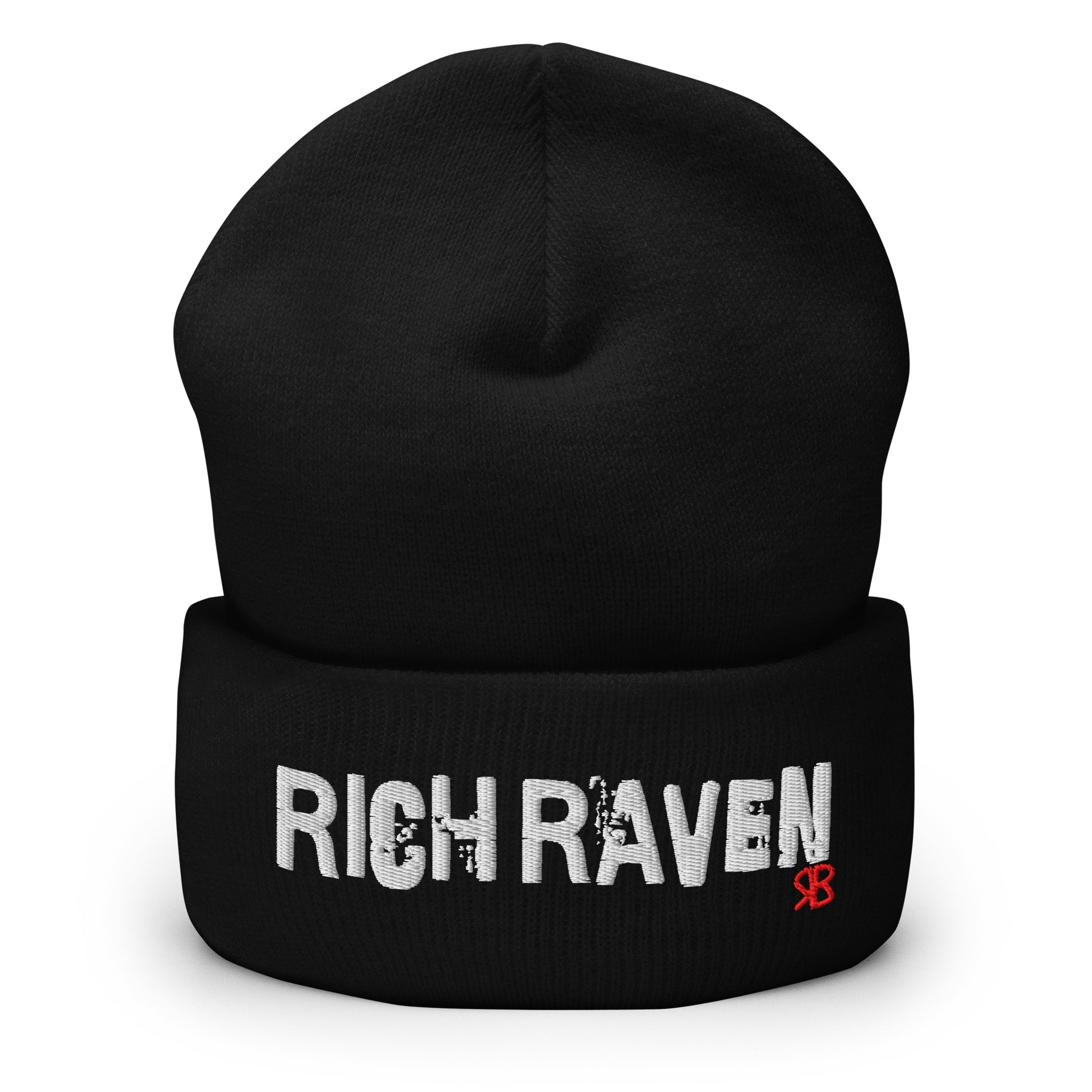 Black knitted beanie with the embroidered phrase “Rich Raven” in white script and a small red RB logo on the fold-over cuff, displayed against a clean white background.