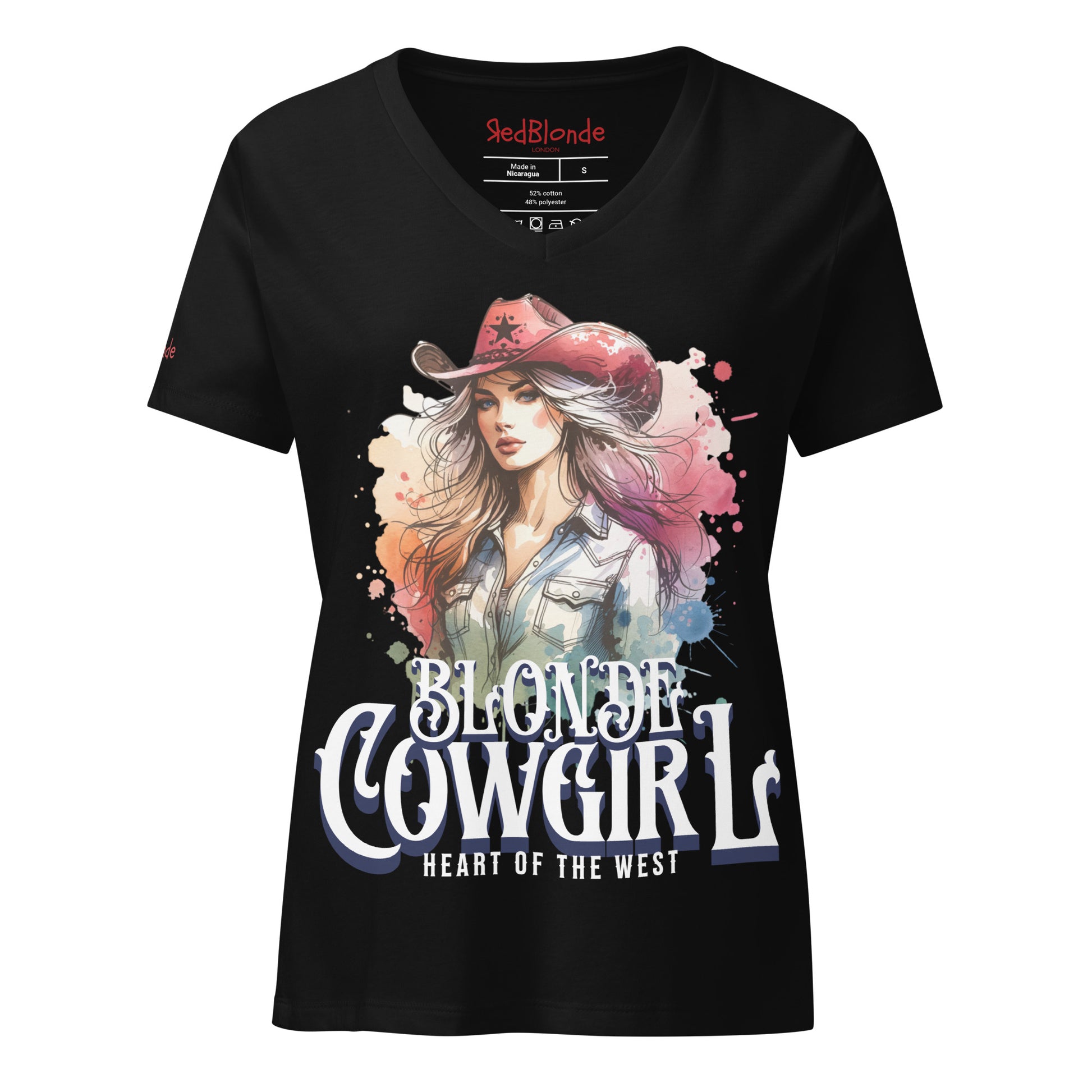 Black V-neck women’s T-shirt with a colorful graphic of a stylish blonde cowgirl wearing a red cowboy hat and denim shirt, paired with the bold text “Blonde Cowgirl” and “Heart of the West” in white western-style font. Branded RedBlonde on inside neck and right sleeve