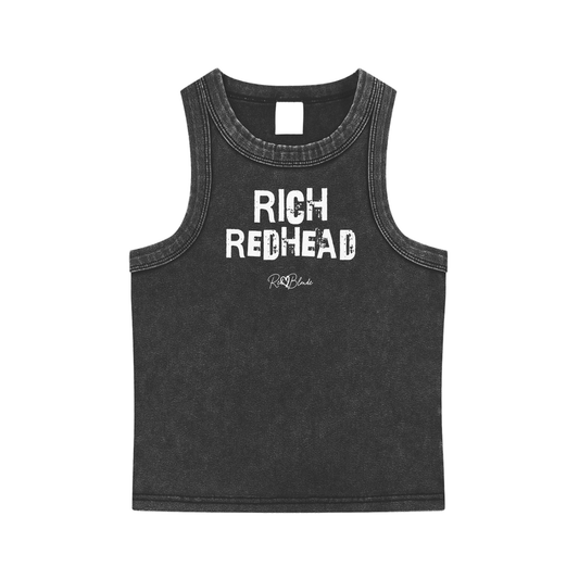 Black acid-wash vintage tank top with bold white Ed Gein font “RICH REDHEAD" slogan on the front and RedBlonde logo beneath.