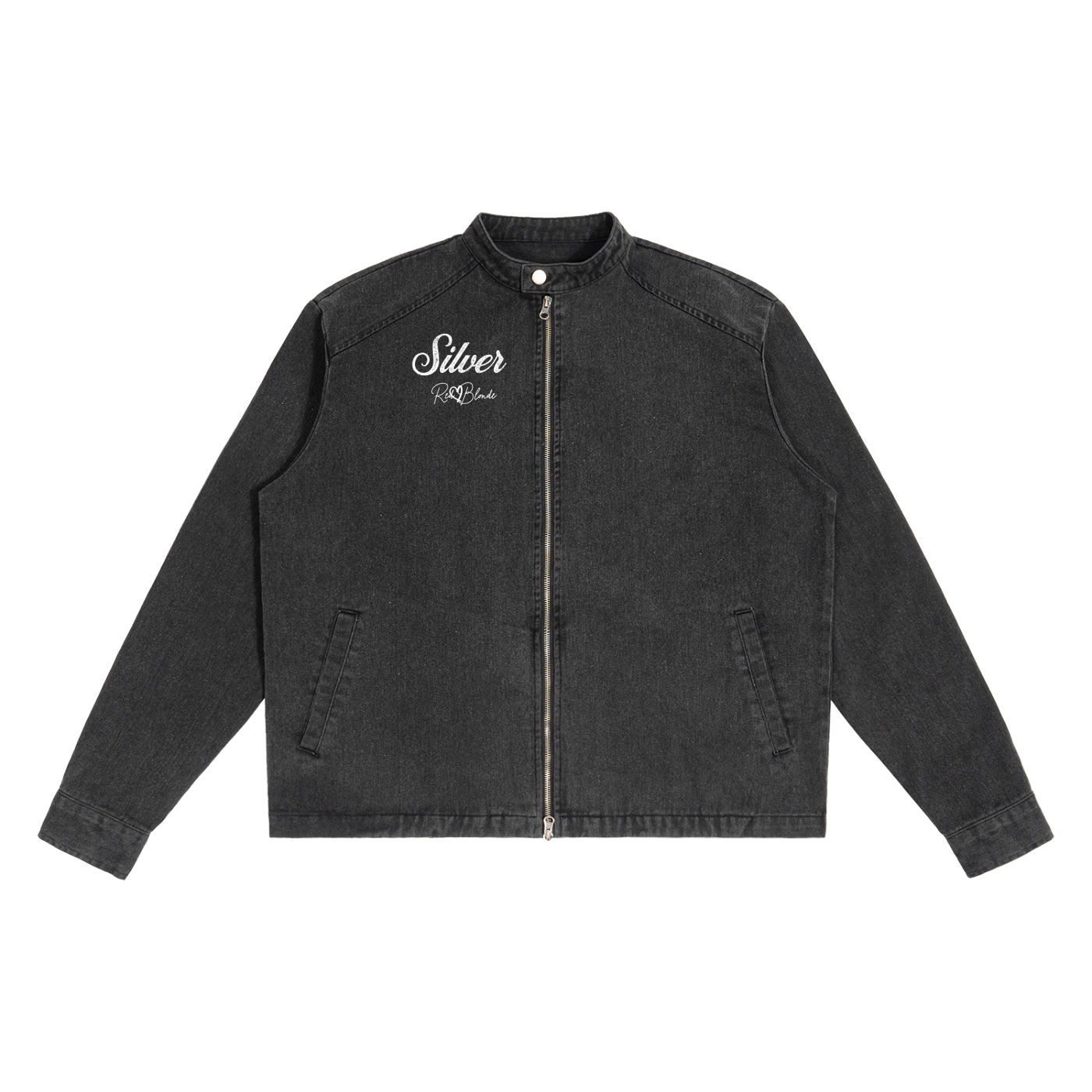 A washed-black denim jacket with a straight, boxy cut and a stand collar. The front features a full silver zip, two slanted pockets, and white embroidered text on the left chest that reads "Silver" with the RedBlonde signature underneath. The jacket has long sleeves with button cuffs