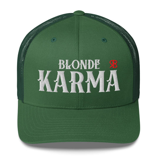 Evergreen green retro trucker cap with mesh back. The front features bold white embroidered text reading "BLONDE KARMA" with a small red RB logo to the right.