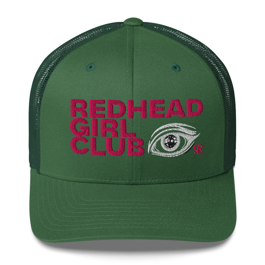 Green mesh trucker hat featuring bold red embroidered text “Redhead Girl Club” alongside a detailed embroidered eye graphic and a small red RB logo.