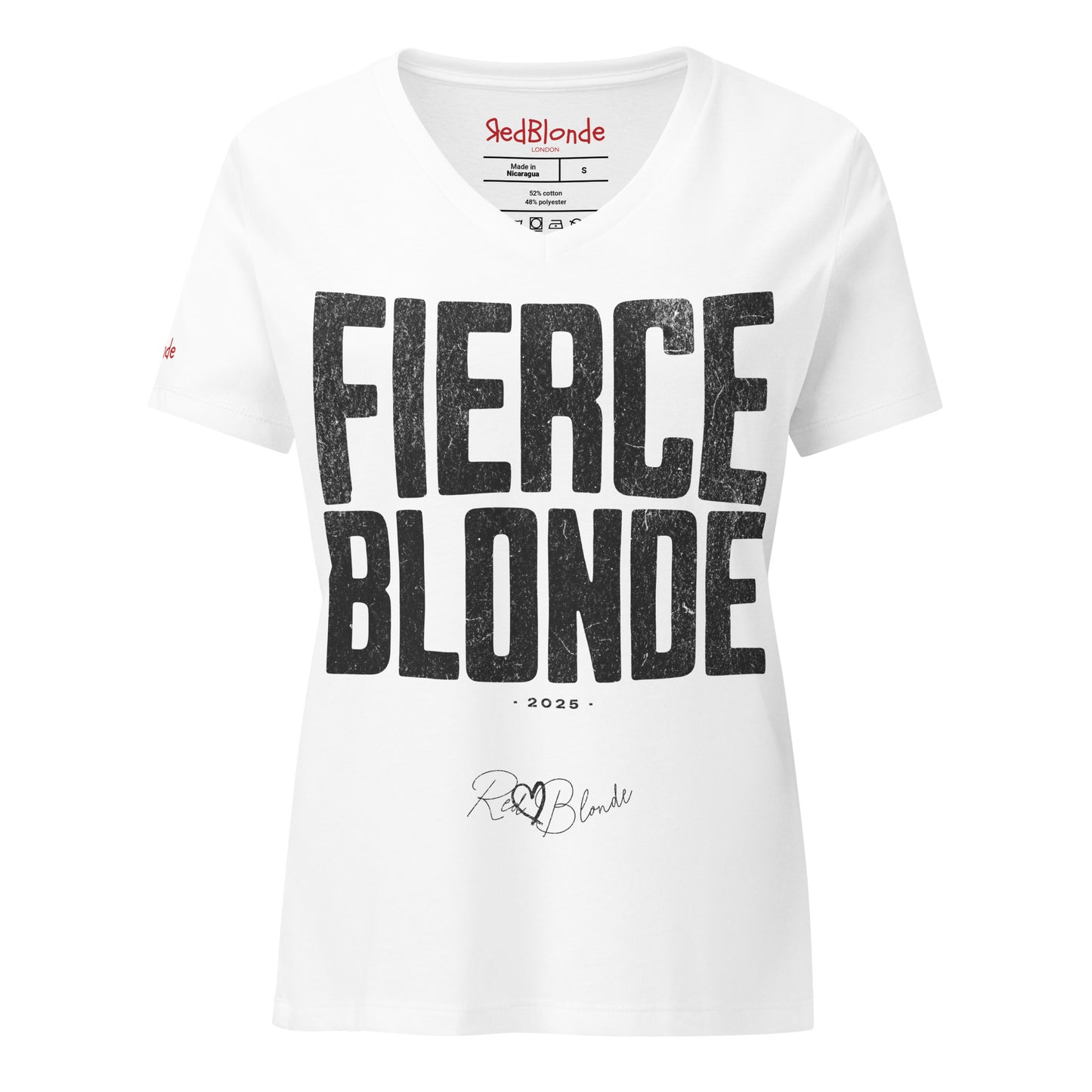 White women’s V-neck T-shirt featuring the bold black distressed text “FIERCE BLONDE” in large North Road capital letters across the chest. Beneath the text, the year “2025” is printed in small type, with the “RedBlonde” brand signature logo below it. The inner collar shows the “RedBlonde” brand name in red along with sizing and care details, and “RedBlonde” is also printed in small red letters on the right sleeve.