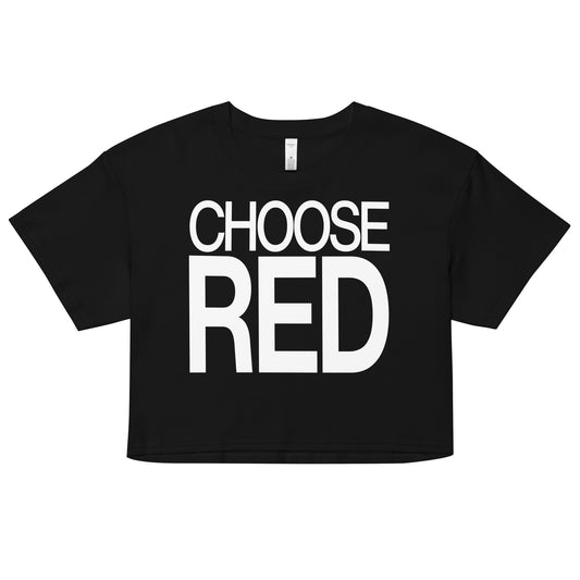 Flatlay of a black women's crop top  graphic t-shirt with “CHOOSE RED” in white Helvetica Now font emblazoned on the front. 