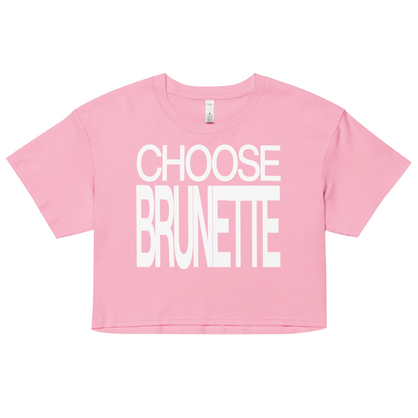 Flatlay of a pink women's crop top  graphic t-shirt with “CHOOSE BRUNETTE” in white Helvetica Now font emblazoned on the front. 