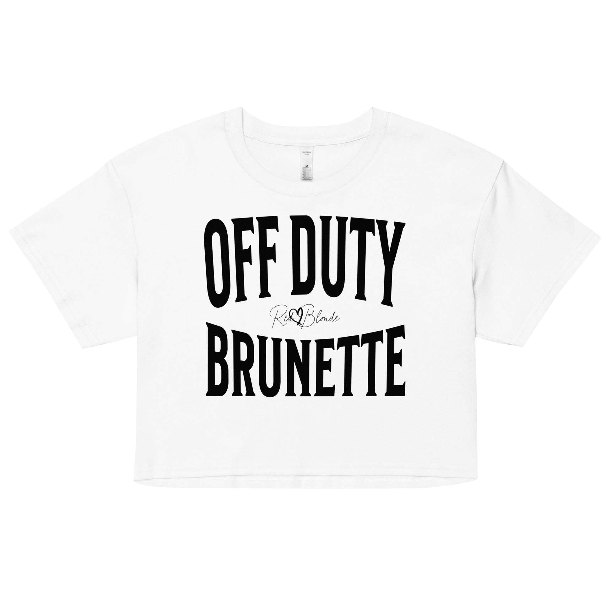 Flatlay of a white women's crop top  graphic t-shirt with “OFF DUTY BRUNETTE” in black Helvetica Now font emblazoned on the front, signed off RedBlonde