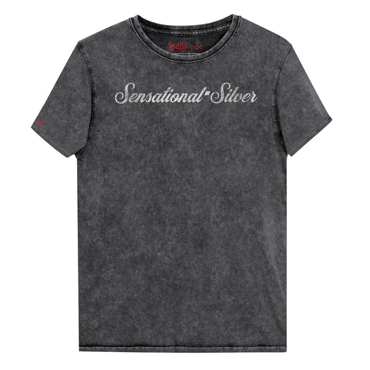 Flatlay of black denim wash vintage unisex relaxed fit slogan t-shirt with 'Sensational Silver' in milkshake script white font. Branded RedBlonde in red on inside neck and right sleeve