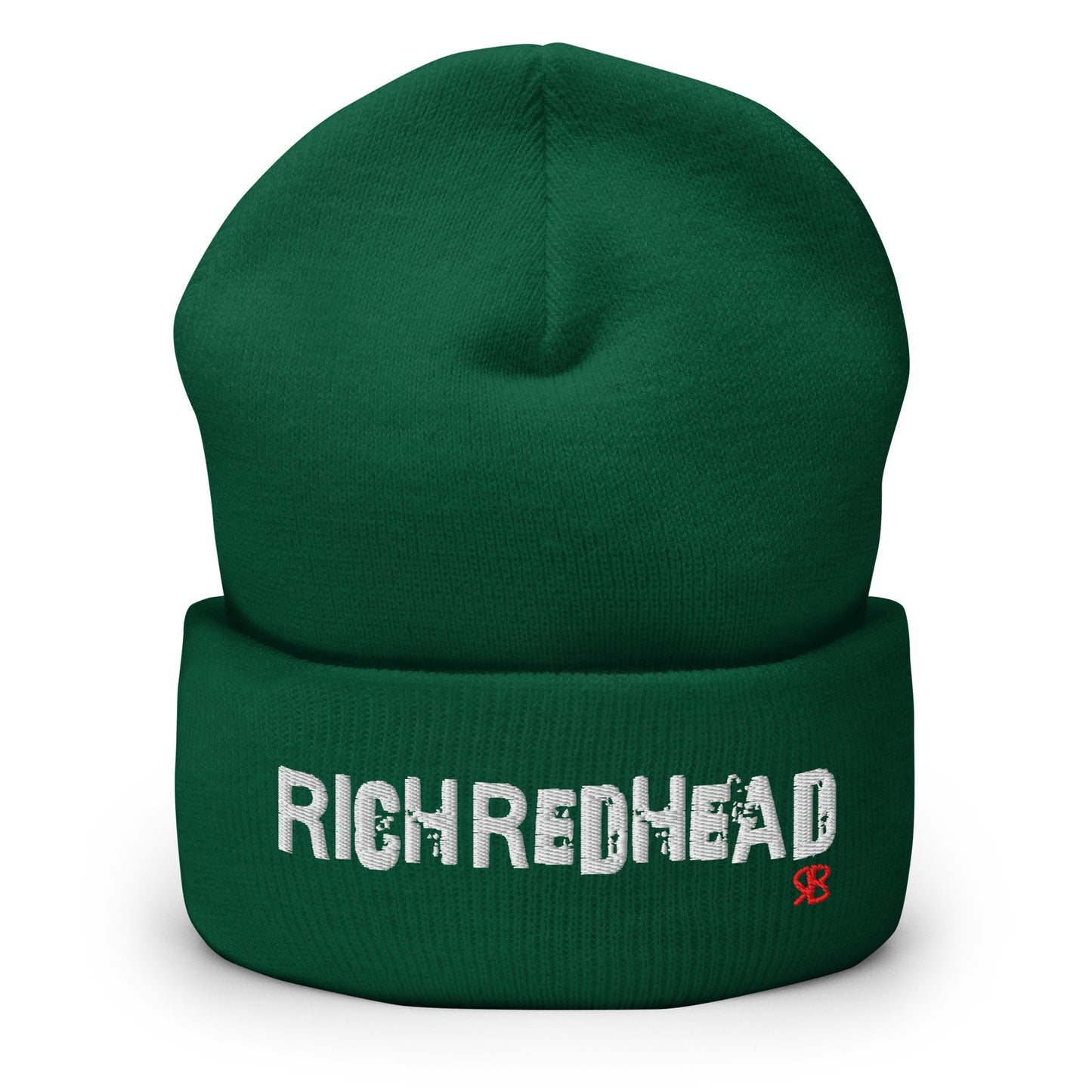 Green cuffed beanie with the embroidered slogan “RICH REDHEAD” in bold white distressed-style lettering, featuring a small red “RB” RedBlonde logo on the right side of the fold. The beanie is shown upright against a clean white background.