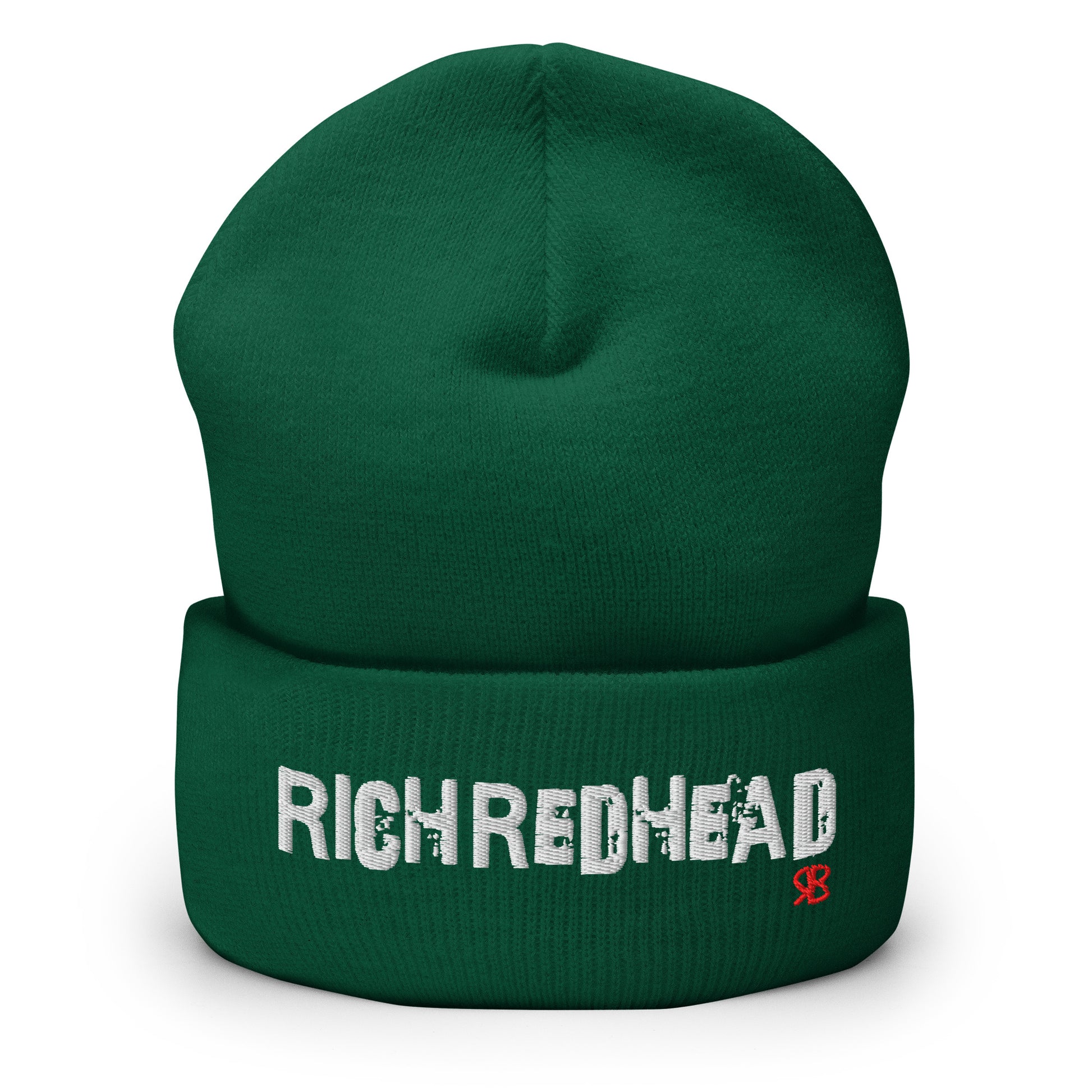 Green cuffed beanie with the embroidered slogan “RICH REDHEAD” in bold white distressed-style lettering, featuring a small red “RB” RedBlonde logo on the right side of the fold. The beanie is shown upright against a clean white background.