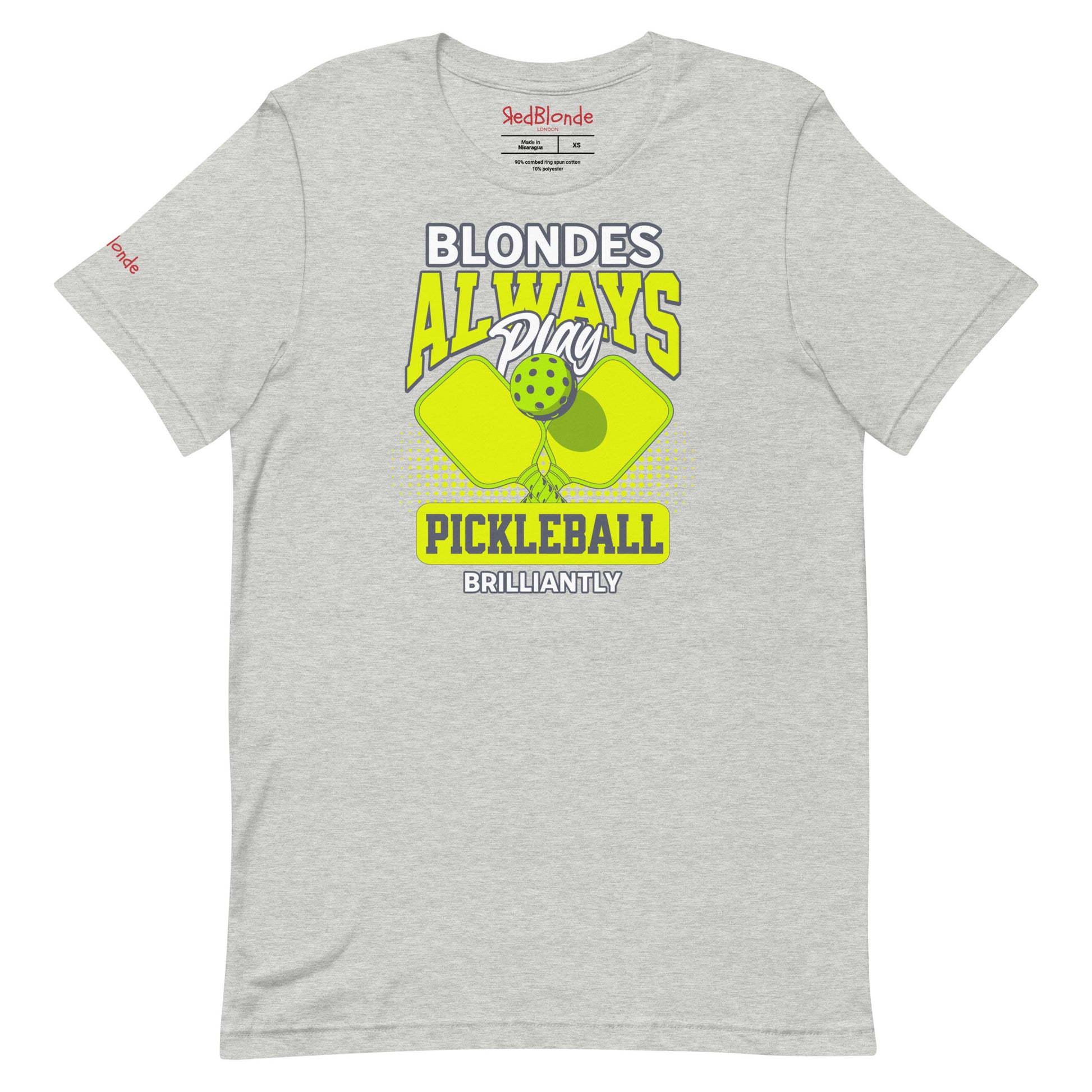 Grey unisex t-shirt featuring the phrase "Blondes Always Play Pickleball Brilliantly" in bold neon yellow and grey lettering, with two neon yellow pickleball paddles and a green pickleball in the center. Branded RedBlonde on inside the neck and on the right sleeve.
