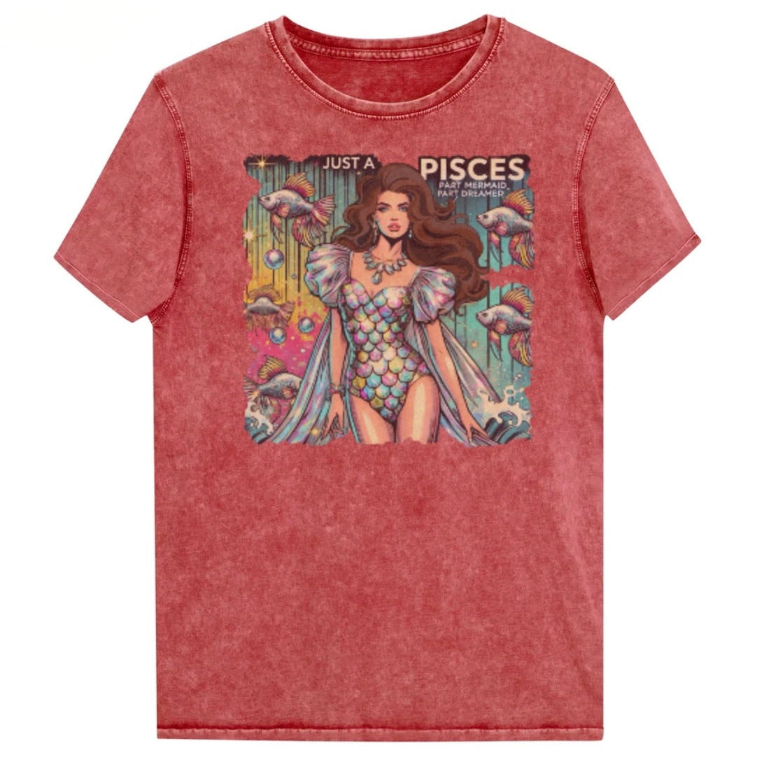 Flatlay of a unisex red garnet denim wash vintage t-shirt with a retro pop-art Pisces graphic featuring a brunette woman in a fish-scale dress, with fishes and bubbles backdrop, captioned ‘Just a Pisces, Part Mermaid, Part Dreamer'. Branded RedBlonde in red on inside neck and right shoulder