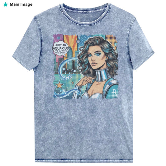 Flatlay of a blue denim vintage denim-wash unisex t-shirt with a retro pop-art Aquarius graphic showing the head and shoulders of a brunette woman with blue highlights wearing a sci-fi type silver choker and outfit, with a city background with tentacles and stars captioned, "Just an Aquarius, the ultimate free spirit". Branded Redblonde on inside neck and right shoulder