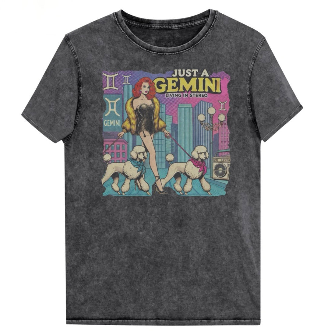 Flatlay of a unisex black denim wash vintage t-shirt with a retro pop-art Gemini graphic featuring a redhead woman, in a short catsuit and fur coat walking two poodle dogs with neck scarfs with a city backdrop and a gettoblaster ‘Just a Gemini, Living in Stereo'. Branded RedBlonde on inside neck and right shoulder
