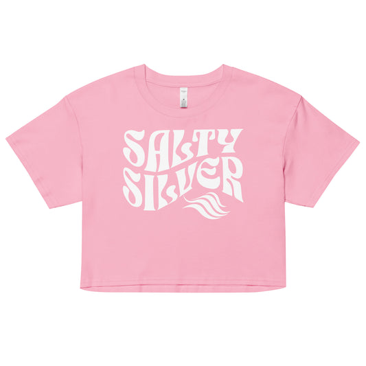 Pale Pink loose women's crop top t-shirt with the words ‘Salty Silver’ in white solino display retro wavy 70s font