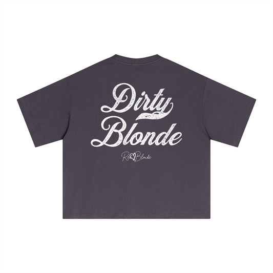 Back view of a plum boxy oversized unisex T-shirt with bold white Milkstore 01 vintage-style script reading “Dirty Blonde” and the RedBlonde signature logo beneath