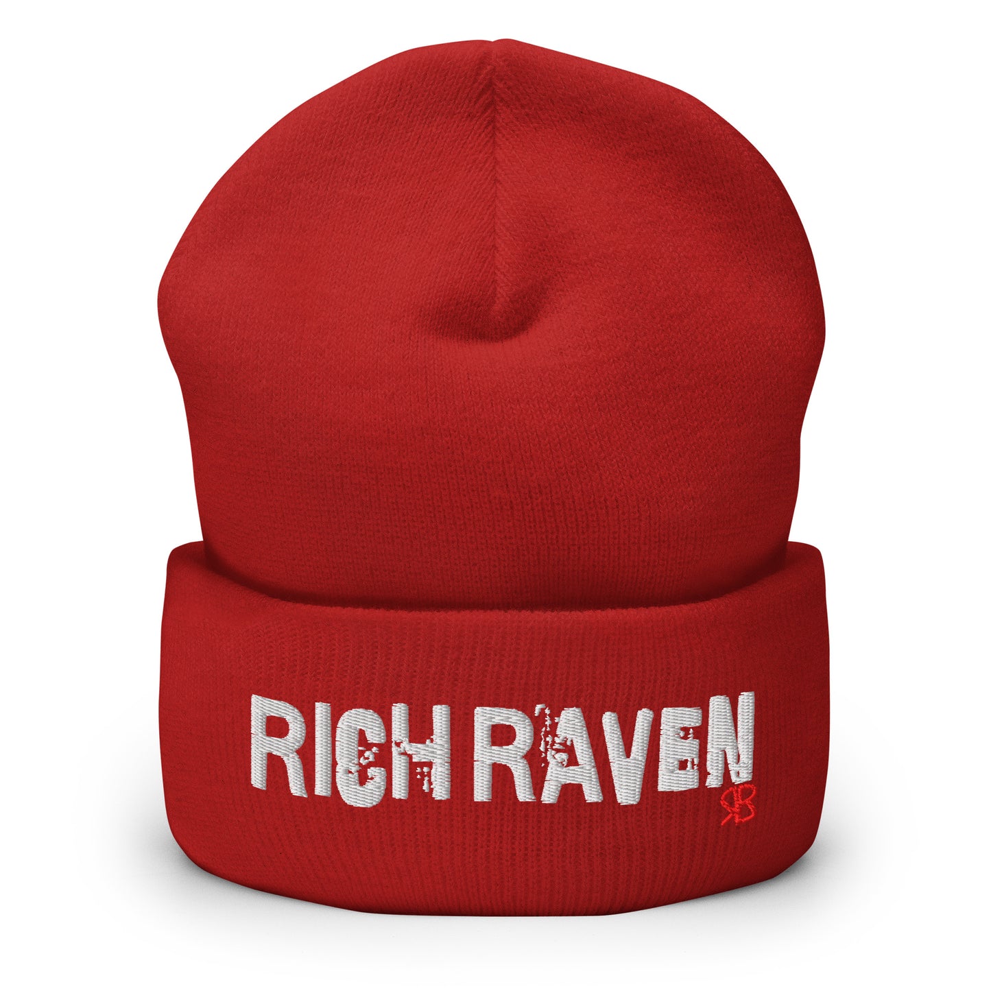Red knitted beanie with the embroidered phrase “Rich Raven” in white script and a small red RB logo on the fold-over cuff, displayed against a clean white background.