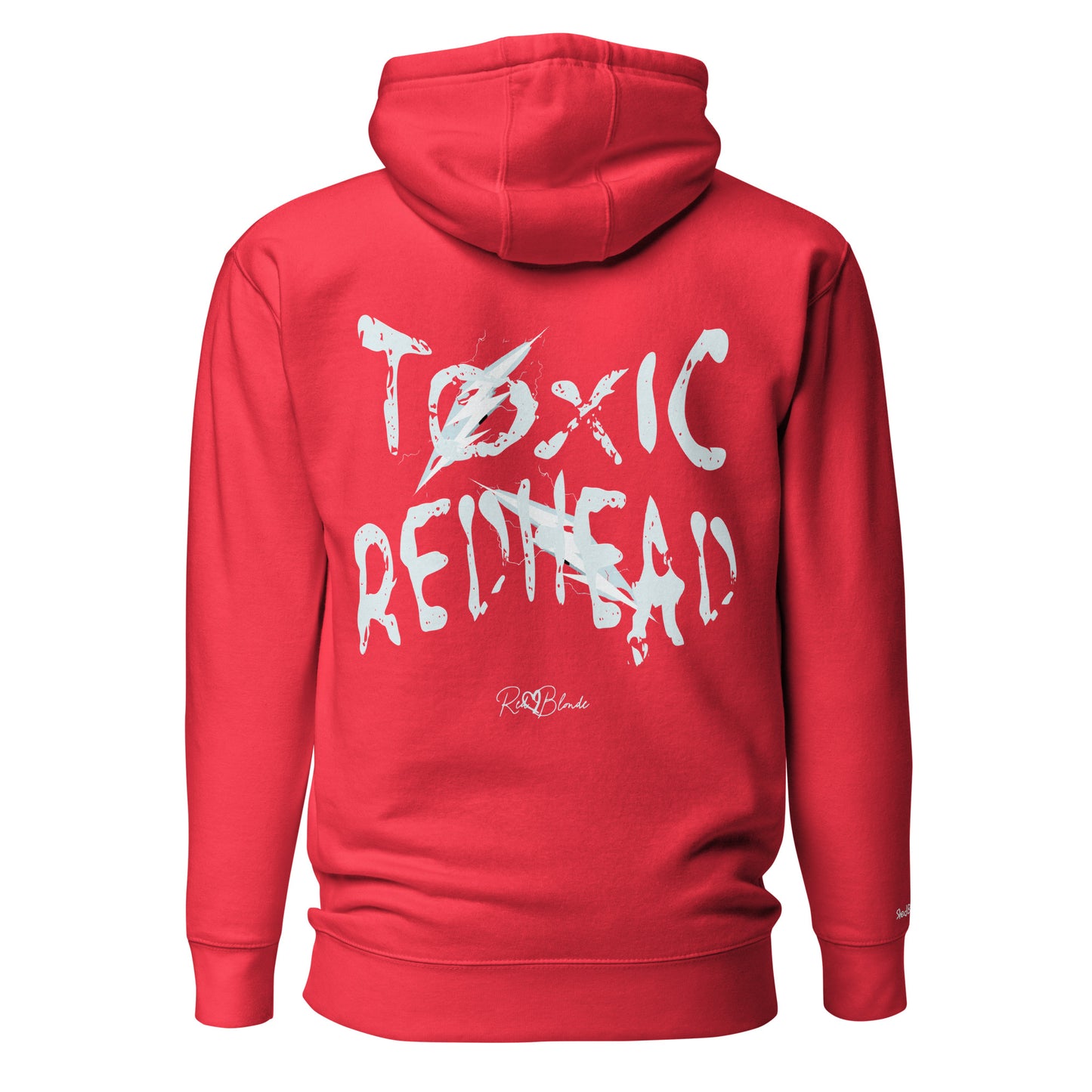 Back view of a garnet red unisex hoodie featuring bold distressed white Chainsaw Carnage text reading “Toxic Redhead” with lightning-style accents and the RedBlonde signature logo underneath. The design has an edgy, electric aesthetic.It features the text 'Blonde' embroidered on the front. Branded RedBlonde in red on right sleeve.