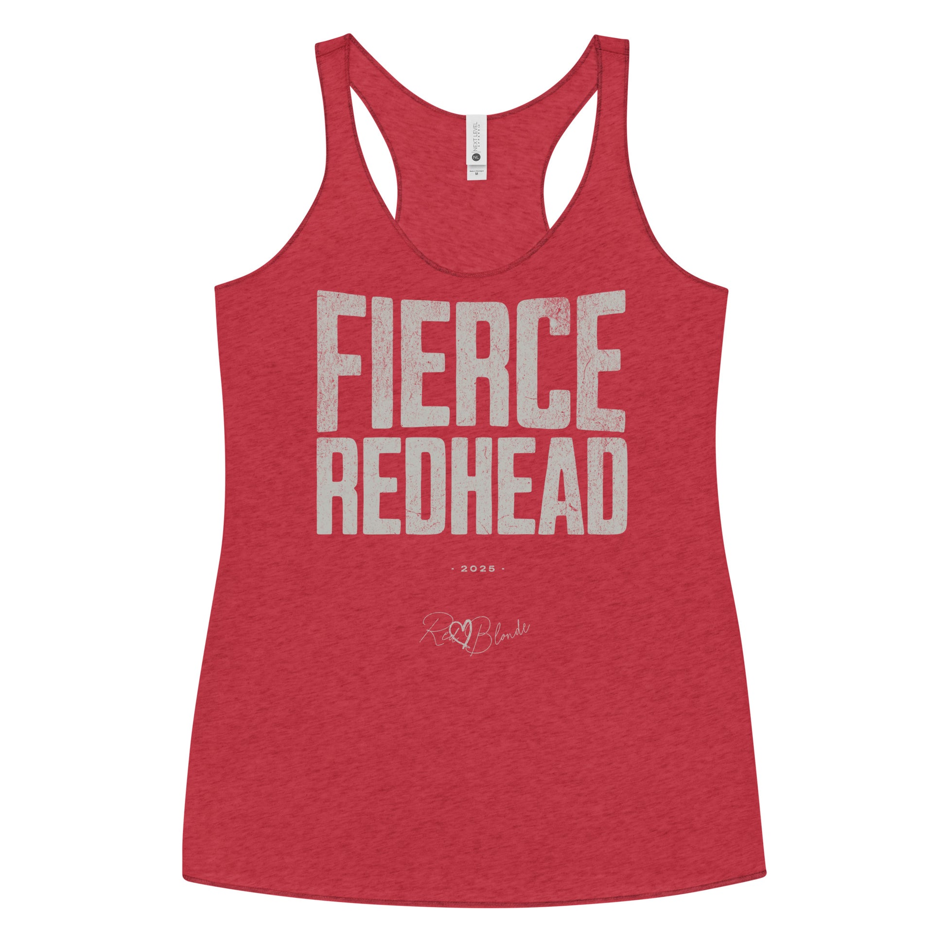 Red women’s racerback tank top with the bold, distressed North Road font text  "FIERCE REDHEAD" in large uppercase white letters across the chest. Below it, in smaller white text, is “• 2025 •” followed by a script-style signature reading “RedBlonde.”