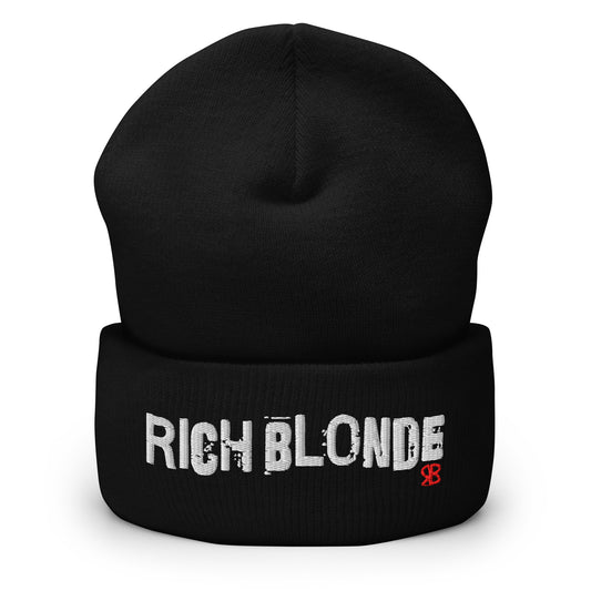 Black cuffed beanie featuring bold white embroidered text “RICH BLONDE” across the front and a small red RB logo detail on the fold.