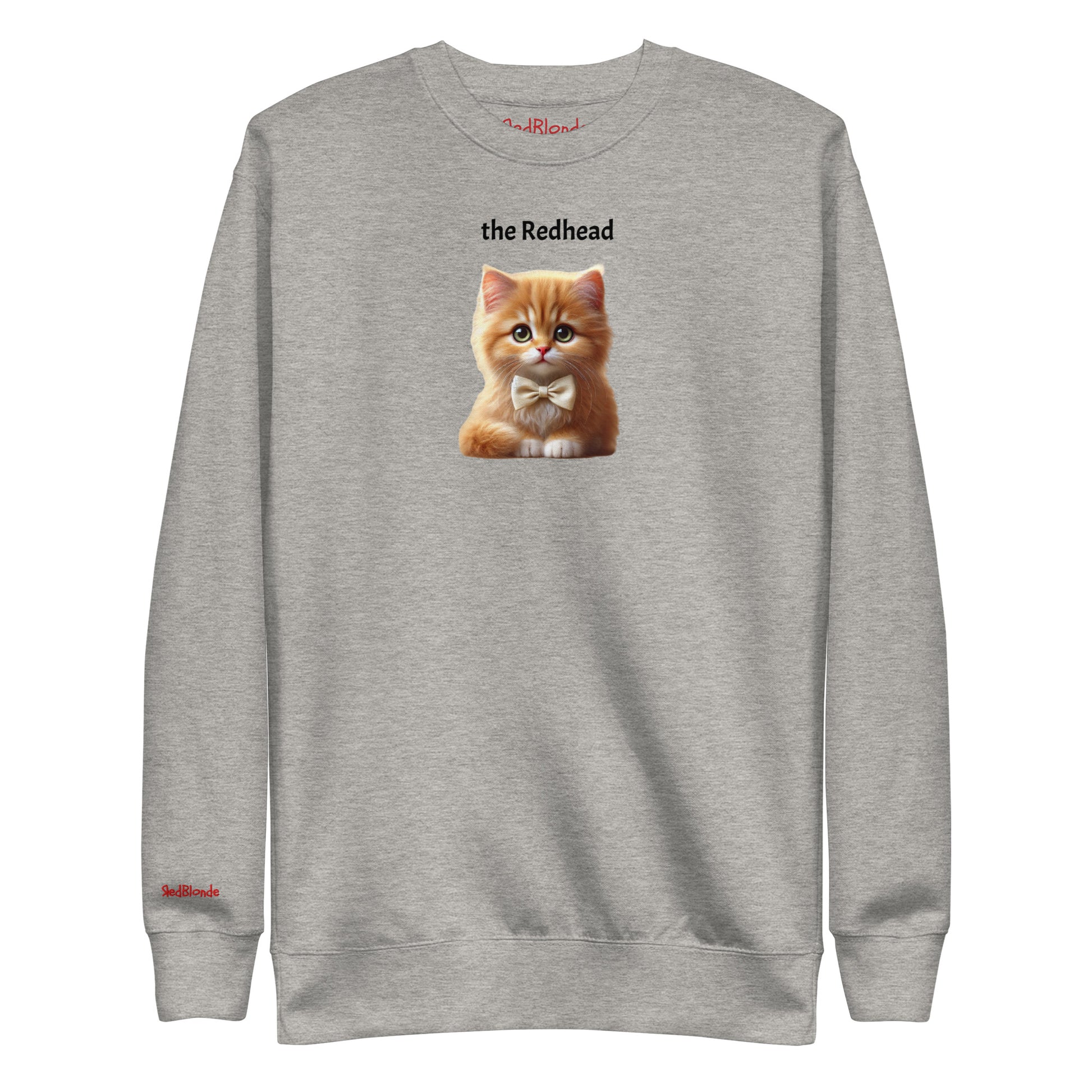 Flatlay of carbon grey relaxed fit unisex sweatshirt with a cute graphic of a redhead kitten wearing a bow-tie and the words 'the Redhead' linking to Red hair. Branded RedBlonde in red on inside neck and right cuff