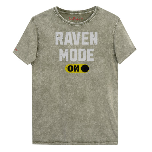 Army Green denim-style unisex t-shirt with bold distressed white Univercity font reading “Raven Mode” and a yellow on/off switch graphic in the “On” position beneath. The design includes subtle worn texture for a vintage look. Branded RedBlonde London in red on inside neck and right sleeve