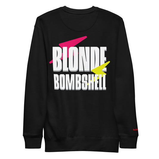 Black unisex sweatshirt with bold white Krisha text “BLONDE BOMBSHELL” on the back, accented by a pink lightning bolt through “BLONDE” and a yellow lightning bolt through “BOMBSHELL.”