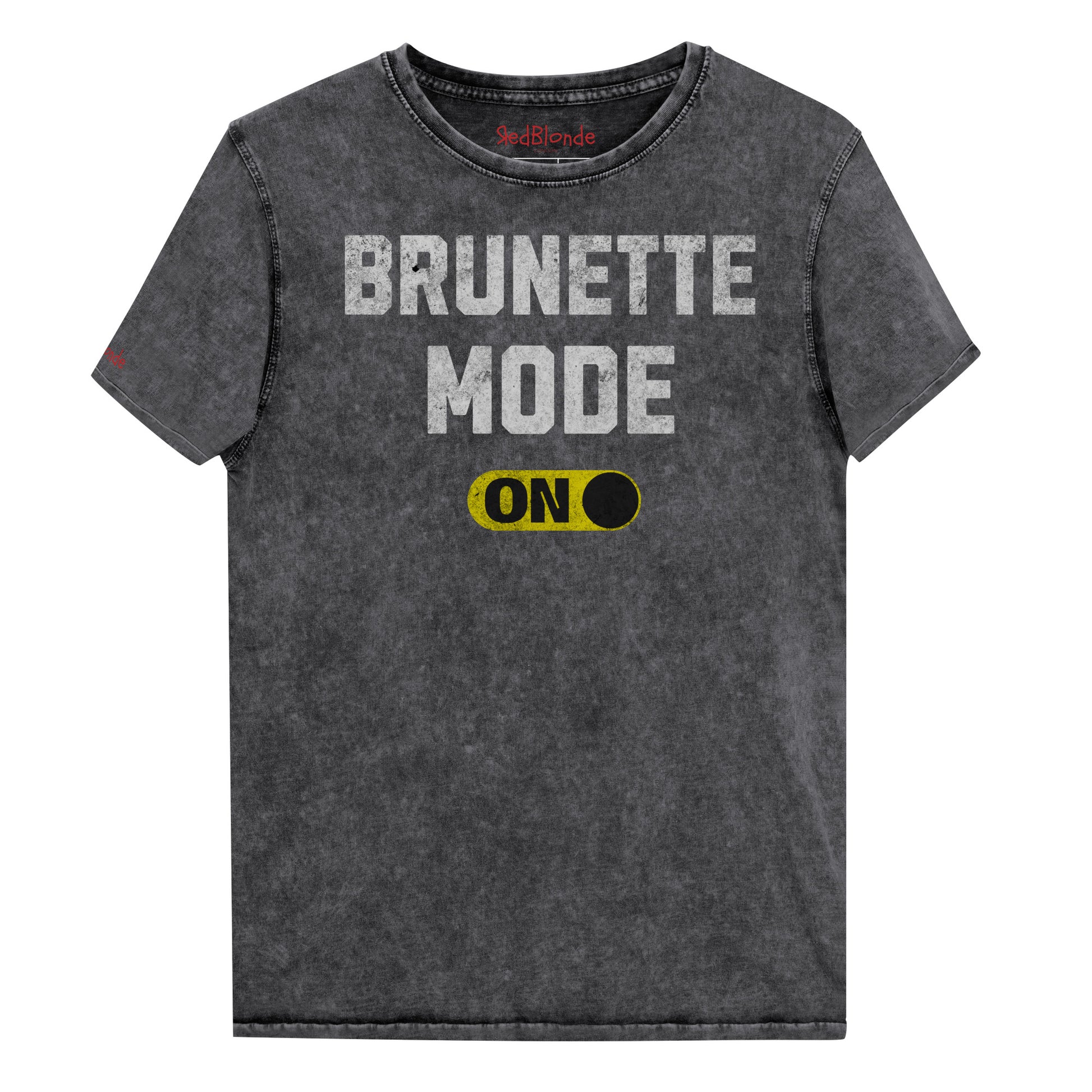 Black denim-style unisex t-shirt with bold distressed white Univercity font reading “Brunette Mode” and a yellow on/off switch graphic in the “On” position beneath. The design includes subtle worn texture for a vintage look. Branded RedBlonde London in red on inside neck and right sleeve