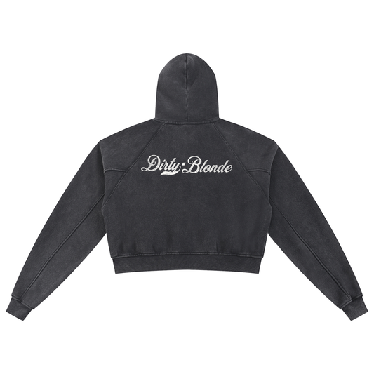 black cropped hoodie with long sleeves and a hood, featuring a white Dirty Blonde Milkstore script logo printed across the upper back.
