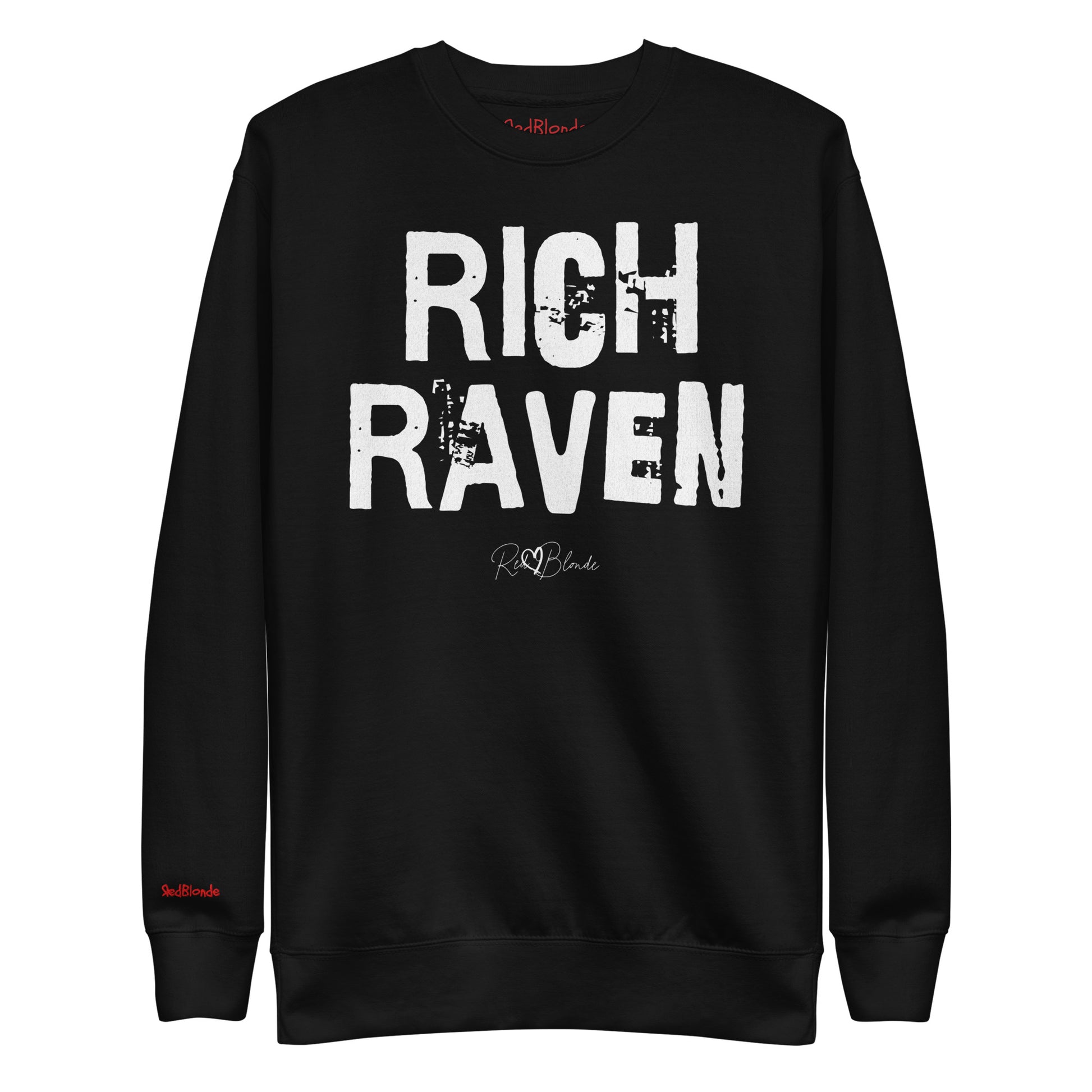 Black unisex premium sweatshirt with bold distressed white Ed Geinitext “RICH RAVEN” on the front, featuring a subtle RedBlonde logo beneath the lettering and on the sleeve cuff and inside neck