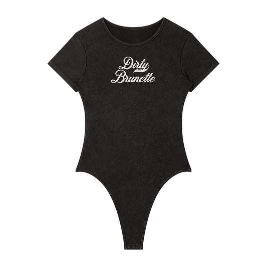 Washed charcoal ribbed short sleeve bodysuit with a crew neckline and white Dirty Brunette Milkstore font graphic at the chest.