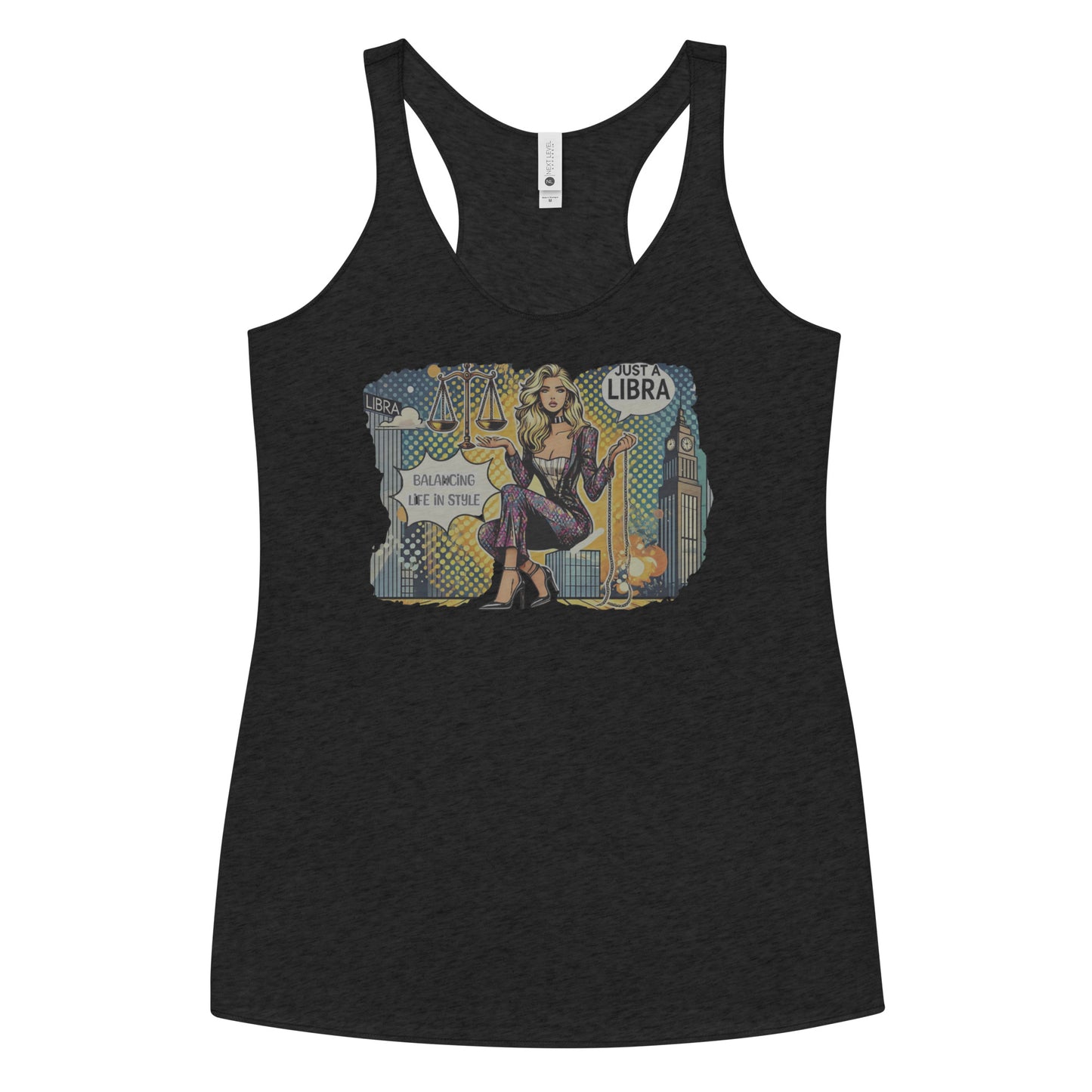 Flatlay of a black soft racerback tank t-shirt with a retro pop-art Libra graphic featuring a blonde woman, scales, and a city backdrop, captioned ‘Just a Libra, Balancing Life if Style’.