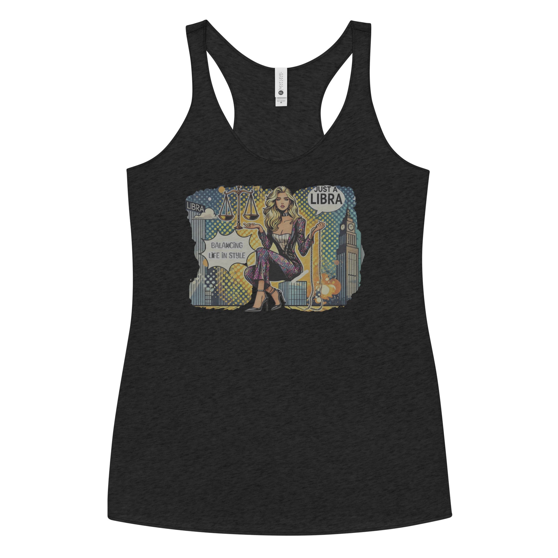Flatlay of a black soft racerback tank t-shirt with a retro pop-art Libra graphic featuring a blonde woman, scales, and a city backdrop, captioned ‘Just a Libra, Balancing Life if Style’.