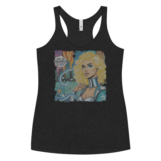 Flatlay of a heather black soft racerback tank t-shirt with a retro pop-art blonde Aquarius graphic showing the head and shoulders of a blonde woman with blue highlights wearing a sci-fi type silver choker and outfit, with a city background with tentacles and stars captioned, "Just an Aquarius, the ultimate free spirit"