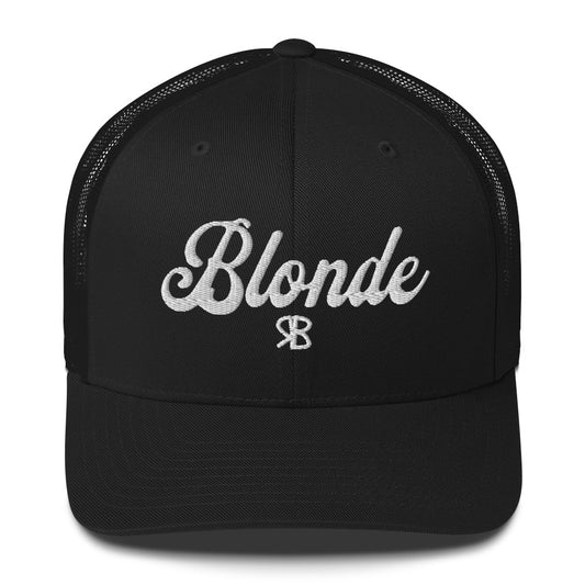 black trucker cap with 'Blonde' in white adventurer 01 font on front. Mesh back. Branded RB