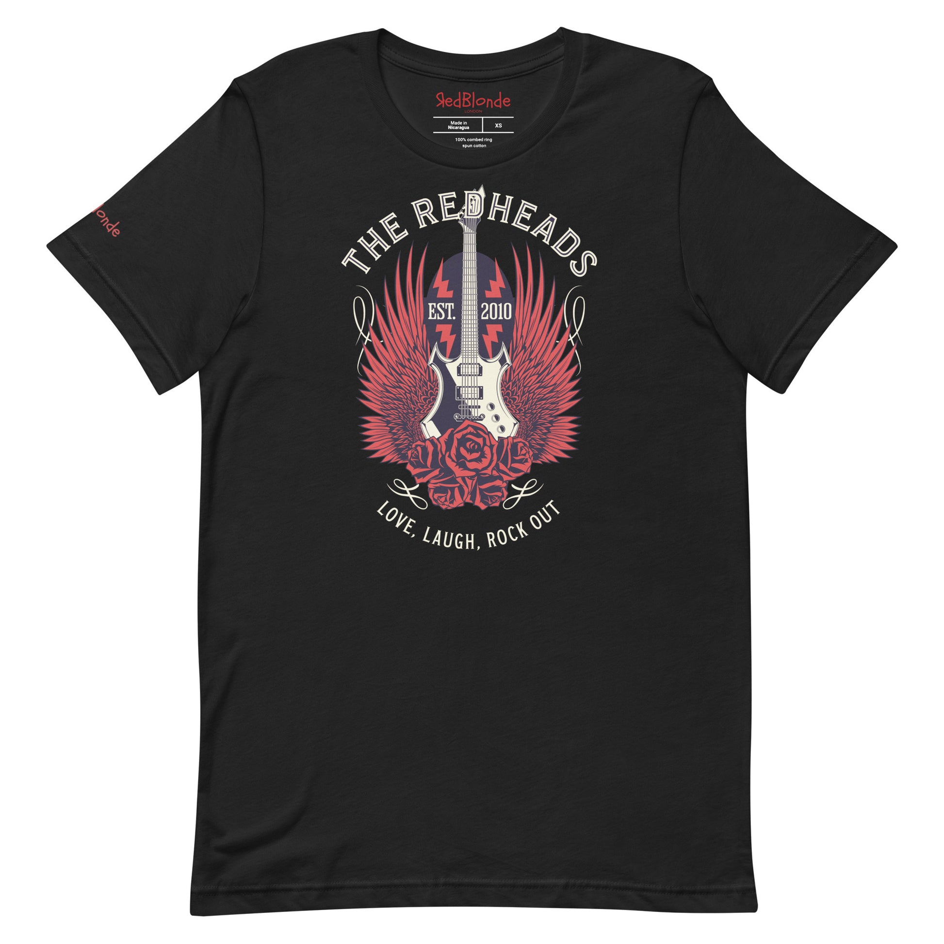 A flatlay of a black unisex t-shirt with a graphic of a black & white guitar with red bird wings emerging from the side. The graphic features ‘THE REDHEADS' in Brookfield font in a semicircle above the guitar, while ‘Love, laugh, rock out’ is underneath. Branded RedBlonde London in inside neck and right sleeve