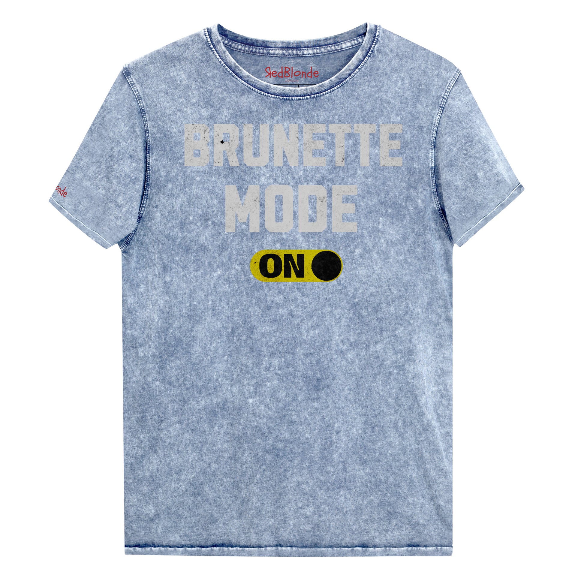 blue denim-style unisex t-shirt with bold distressed white Univercity font reading “Brunette Mode” and a yellow on/off switch graphic in the “On” position beneath. The design includes subtle worn texture for a vintage look. Branded RedBlonde London in red on inside neck and right sleeve