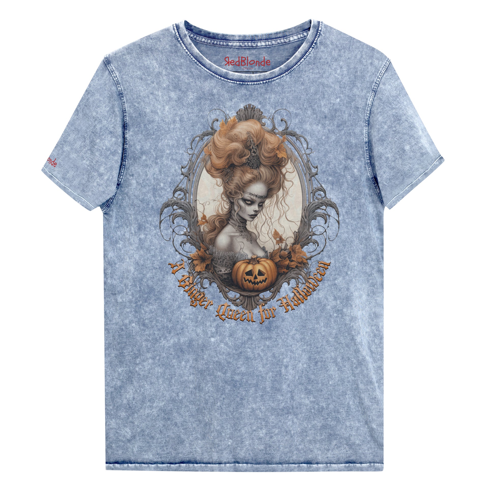 Blue acid-wash unisex T-shirt featuring a gothic-style illustration of ginger-haired woman with an elaborate beehive hairstyle, framed by ornate scrollwork, autumn leaves, and a carved pumpkin. The design is captioned with the text ‘A Blonde Queen for Halloween’ in vintage Dark Angle lettering. Branded RedBlonde in red on inside neck and right sleeve
