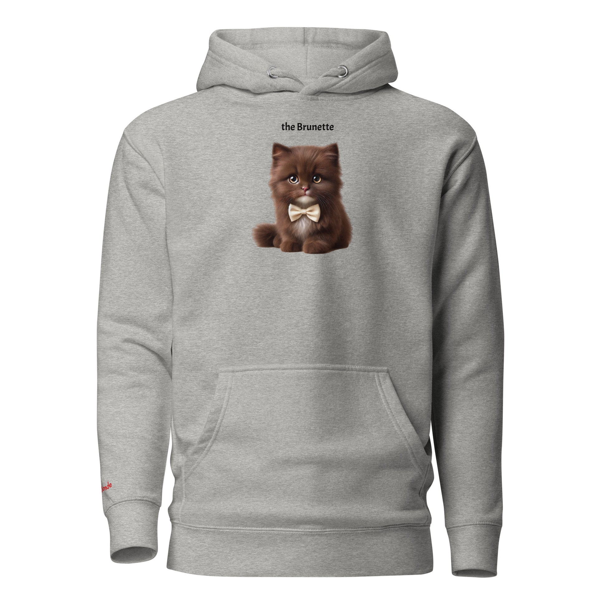 Flatlay of carbon grey relaxed fit unisex hoodie with a cute graphic of a brunette kitten wearing a bow-tie and the words 'the Brunette' linking to Brunette hair. Branded RedBlonde in red on inside neck and right cuff