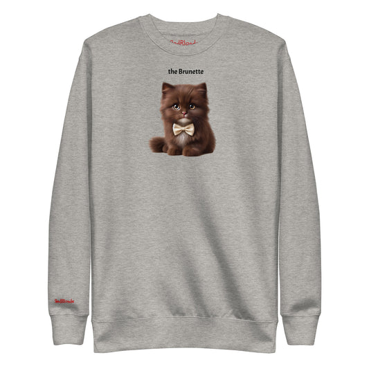 Flatlay of carbon grey relaxed fit unisex sweatshirt with a cute graphic of a brunette kitten wearing a bow-tie and the words 'the Brunette' linking to Brunette hair. Branded RedBlonde in red on inside neck and right cuff