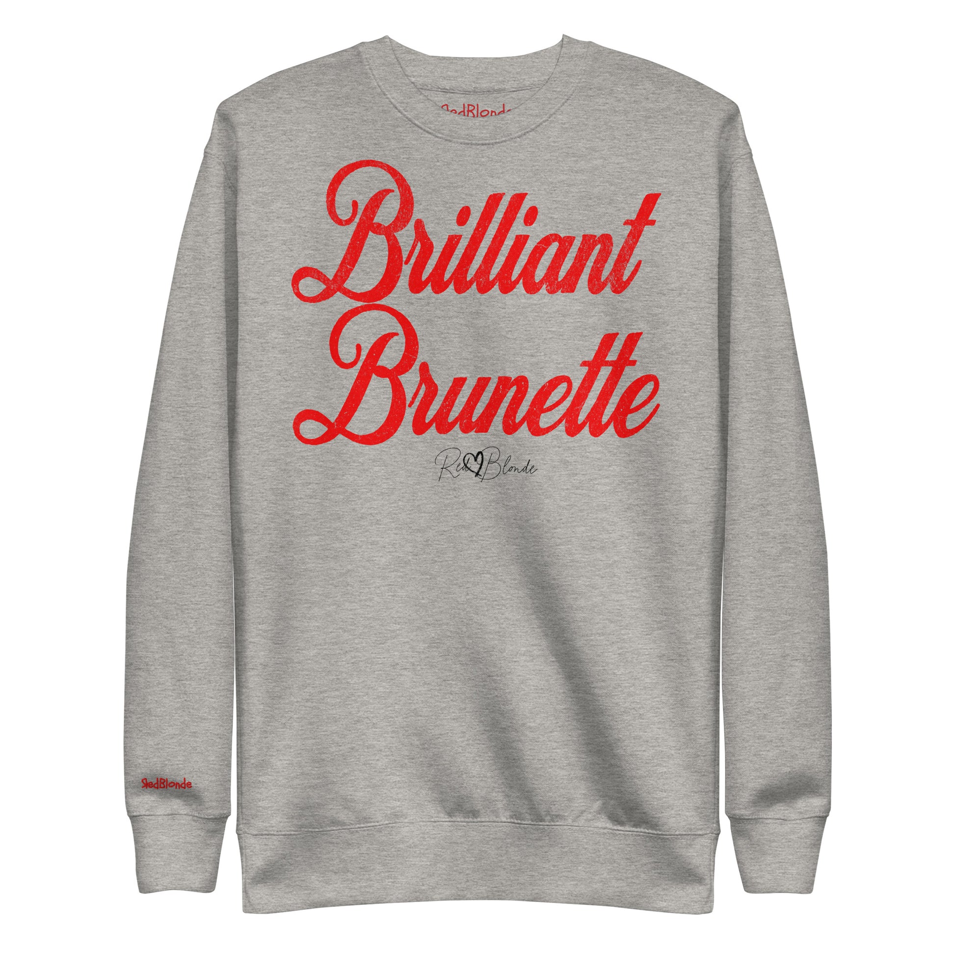 A classic grey relaxed fit unisex sweatshirt with the words 'Brilliant Brunette' written in large red vintage milkstore font, like coco cola script. Branded RedBlonde London in red on inside neck and right sleeve 