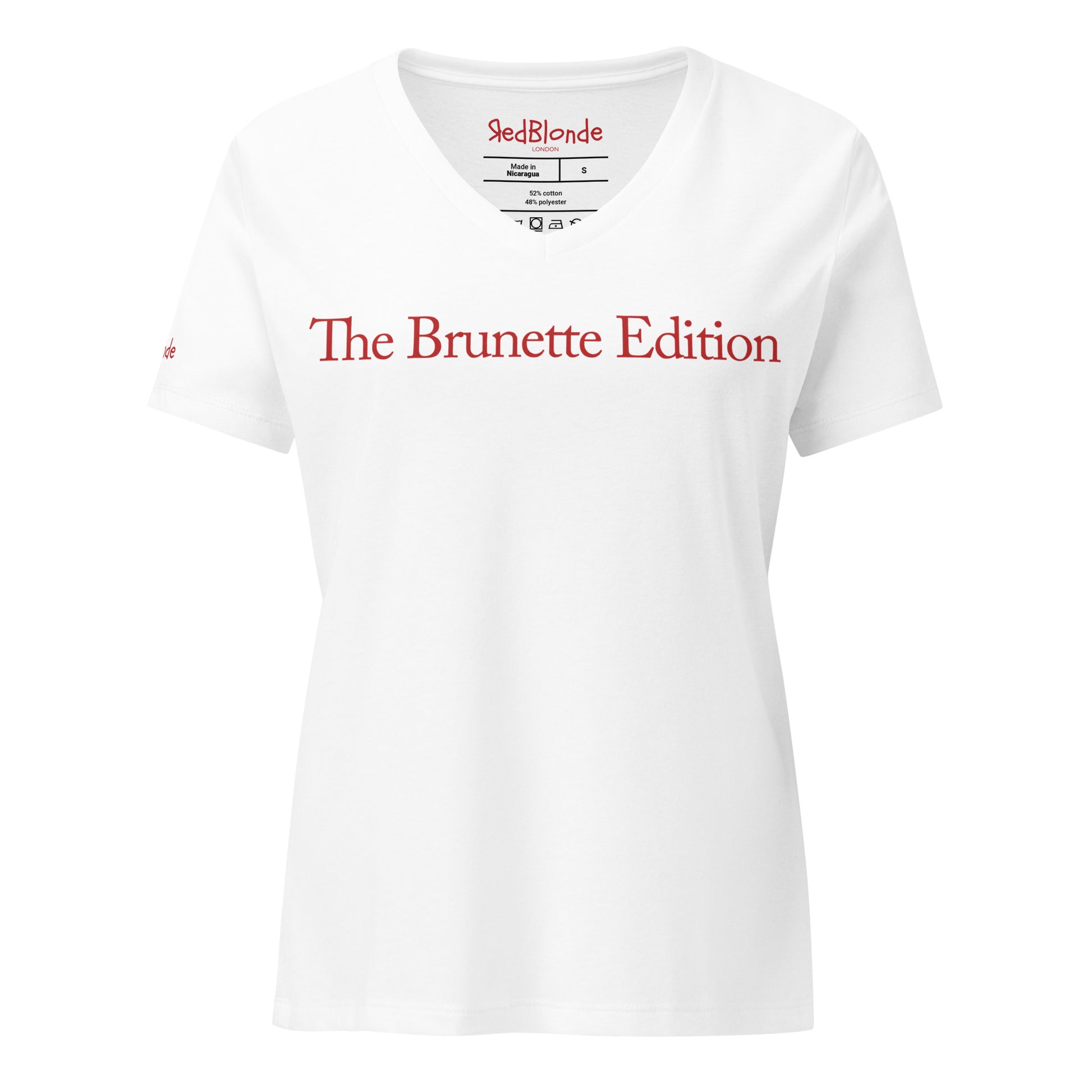 flatlay a relaxed but slightly fitted white v-neck t-shirt with the words 'The Brunette Edition' in red. Branded RedBlonde in red on the inside neck and right sleeve