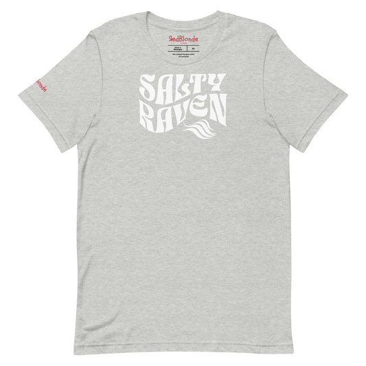 flatlay of gray classic unisex graphic t-shirt with the slogan 'Salty Raven' in Solino Display white retro 70s wavy font. Branded RedBlonde in red on inside neck and right sleeve
