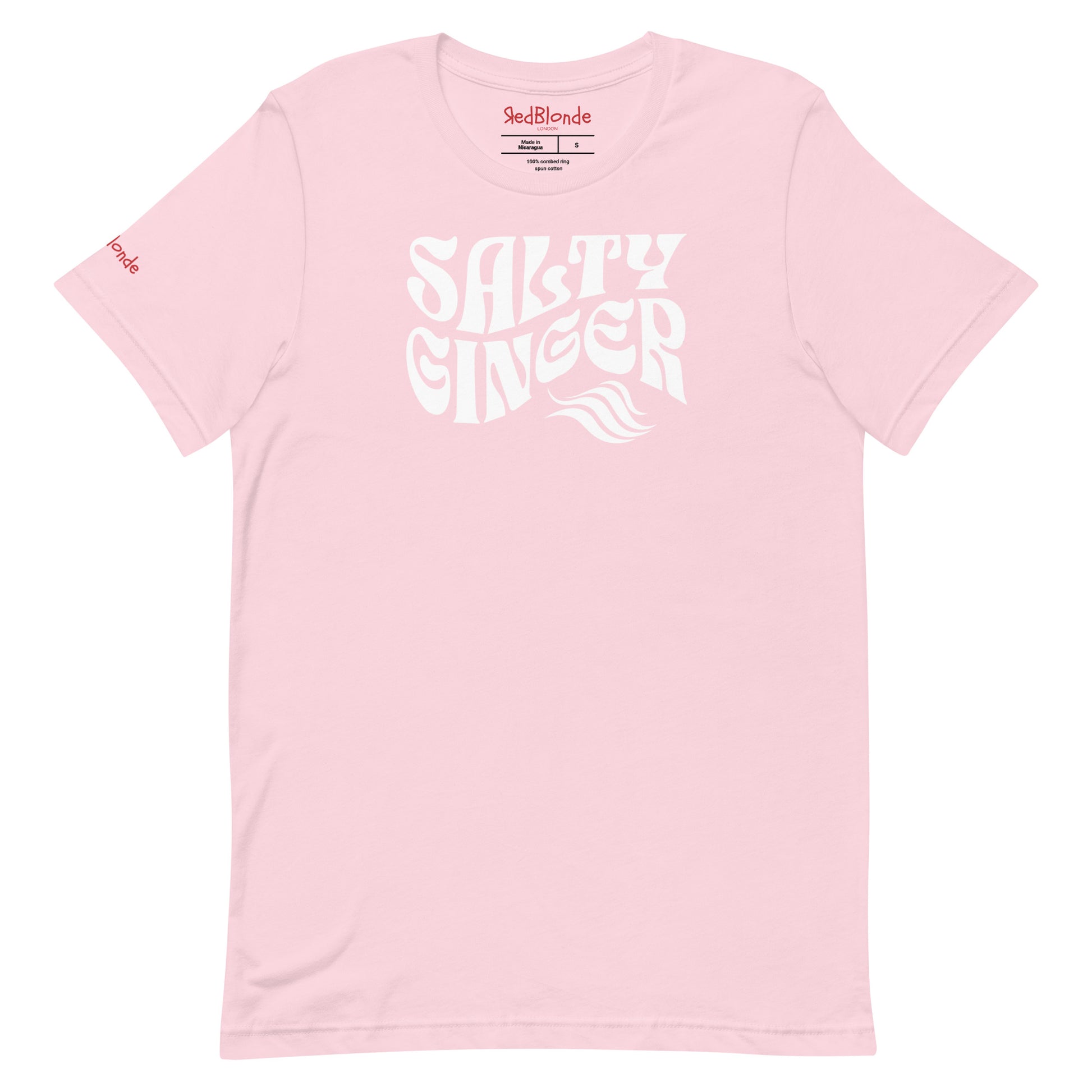 flatlay of pale pink classic unisex graphic t-shirt with the slogan 'Salty Ginger' in Solino Display white retro 70s wavy font. Branded RedBlonde in red on inside neck and right sleeve
