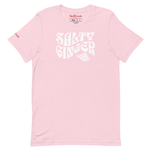 flatlay of pale pink classic unisex graphic t-shirt with the slogan 'Salty Ginger' in Solino Display white retro 70s wavy font. Branded RedBlonde in red on inside neck and right sleeve
